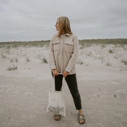 Beige cotton tote bag with wave and love graphic design, suitable for everyday shoulder carry.