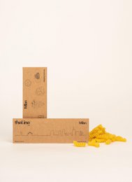 Miniature relief image of the Milano skyline, featuring a compact, geometric design with a neutral color palette.