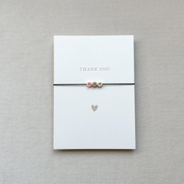 Handmade minimalist thank you card with heart charm, available in a pack of 10.