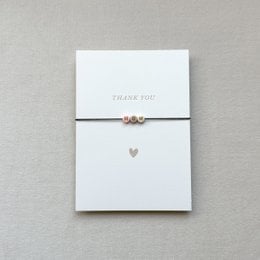 Handmade minimalist thank you card with heart charm, available in a pack of 10.