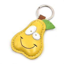Gul pære med smil læder nøglering