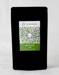 Premium grade matcha powder, vibrant green color, black resealable pouch packaging, organic Japanese tea product.