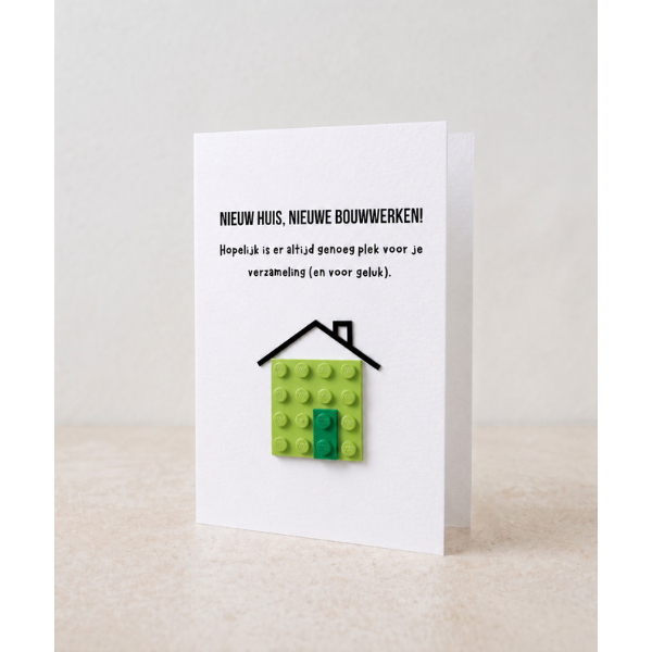 Tarjeta postal de la casa nueva – Ladrillo de construcción