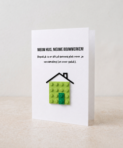 Postkarte „Neues Haus“ – Baustein LEGO