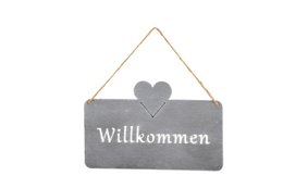 A gray rectangular sign with the German word "Willkommen" (Welcome) and a heart icon, hanging on a rope.