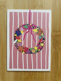Carte en carton en couronne de Noël