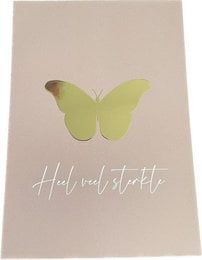 A gold foil greeting card with a vibrant yellow butterfly design and the text "Hello sweet startle" printed on the front.