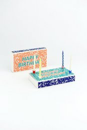 Colorful birthday matchsticks with "Happy Birthday" text and a birthday cake with candles.