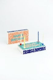 Colorful birthday matchsticks with "Happy Birthday" text and a birthday cake with candles.