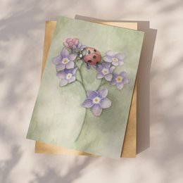 Postal mariquita con flores.