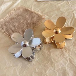 Fermagli per capelli in metallo con artigli di fiori vivaci: oro e argento