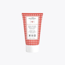 A tanning primer and accelerator cream in a red and white patterned tube. The cream contains ingredients like honey and vitamin E to help prepare and enhance the skin's tanning process.