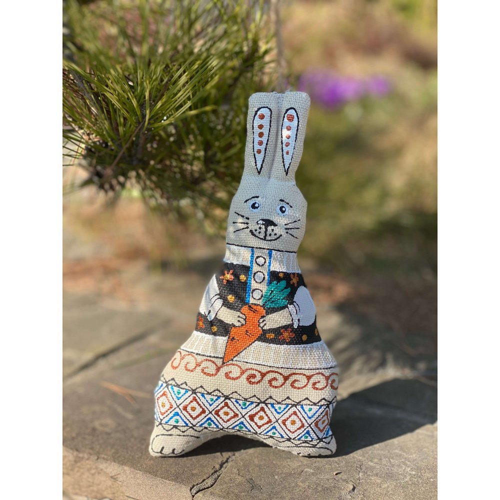 Easter Doe-hare with a carrot