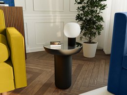 Designer side table in black metal