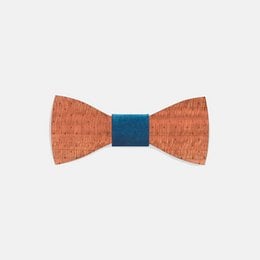 Polka dot wooden bow tie with blue and red accents. Made of natural wood material with a classic bow tie shape.