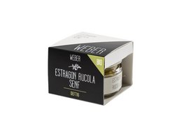 Tarragon mustard in a glass jar with green leaves, a spoon, and a black and white product box.