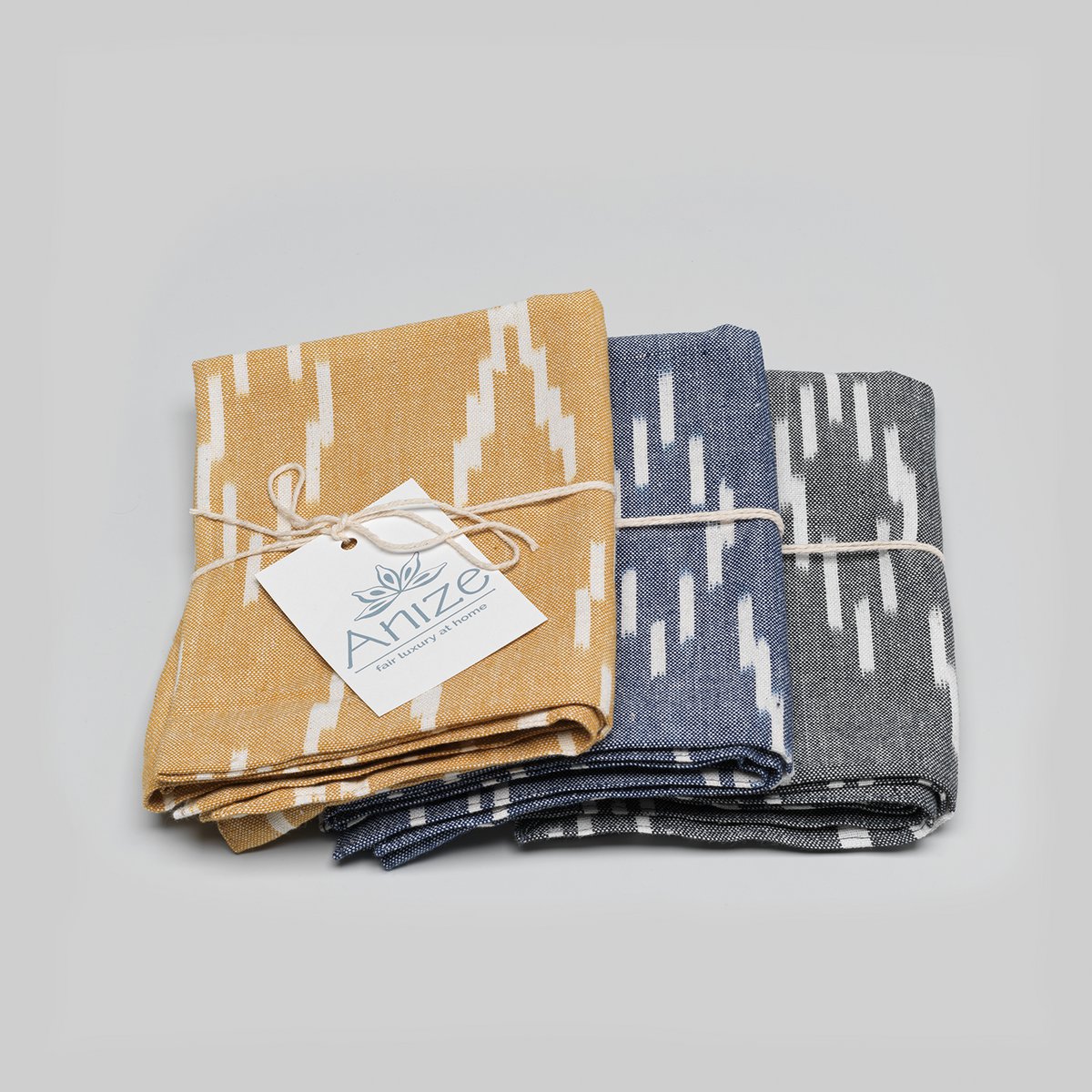 Tea towel, handwoven ikat, ecru v-pattern on navy blue