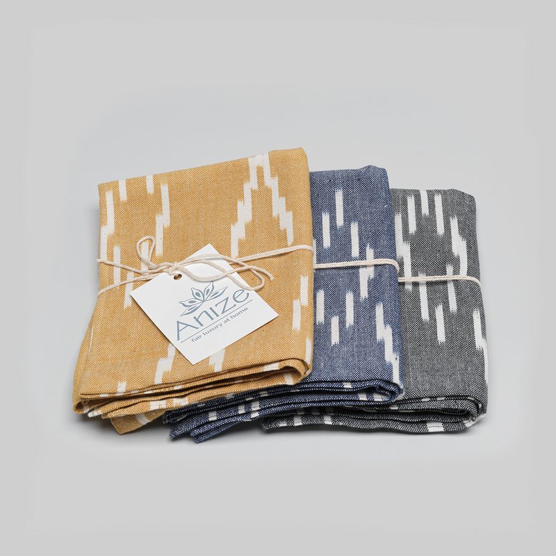 Tea towel, handwoven ikat, ecru v-pattern on navy blue