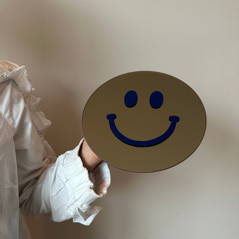 Det lille mørkeblå smil