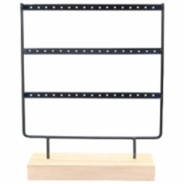 A black metal earring display stand with three tiers for organizing and displaying a variety of earrings. The stand has a wooden base for stability.
