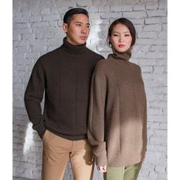 Cozy brown sweater with a high collar and long sleeves, perfect for layering during the colder months.