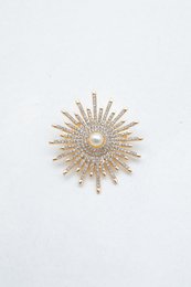 Broche fantaisie en laiton