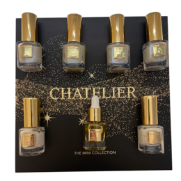 A set of 6 mini nail polish bottles in a black and gold gift box. The nail polishes appear to be cream or nude shades. The box is decorated with gold stars and the Chatelier logo.