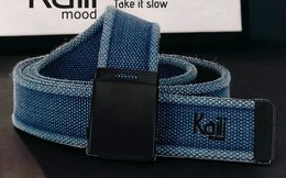 K4010DB | Stone Washed Canvas Ribbon Belt Col. Blue with Matt Black Buckle. Dimensions: 125 x 4 x 0.5 cm One size - Can be shortened. Packaging: Rigid bottom/lid gift box