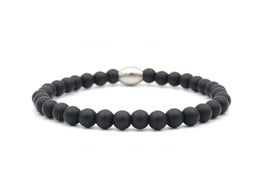 Matte black obsidian bracelet with adjustable sizing from XS to XL.