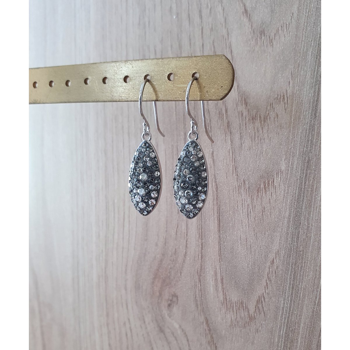 Petite rhodium plated earrings with grey pavé drops