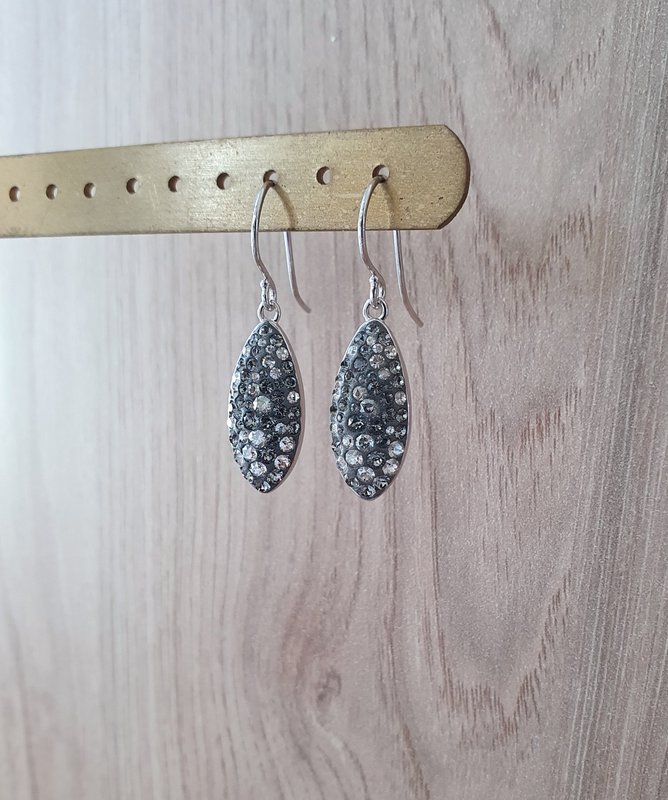Petite rhodium plated earrings with grey pavé drops