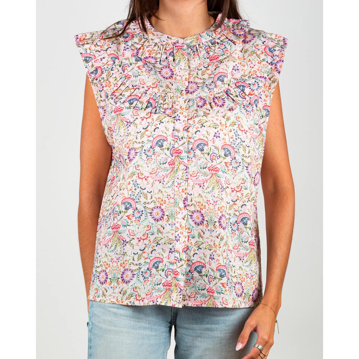La blouse femme sans manches à volants Febre rose