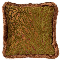  A square throw pillow with a green, textured pattern and a burgundy velvet center. The pillow has a fringed edge and appears to be made of high-quality materials.