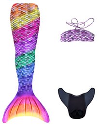 Rainbow mermaid tail set with sequin scales, purple bikini top, black fin, iridescent gradient colors for children.