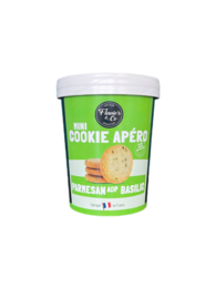 Mini aperitif cookies made with Parmesan A.O.P. and basil, savory crackers in a round shape.