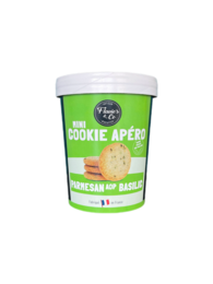 Mini aperitif cookies made with Parmesan A.O.P. and basil, savory crackers in a round shape.