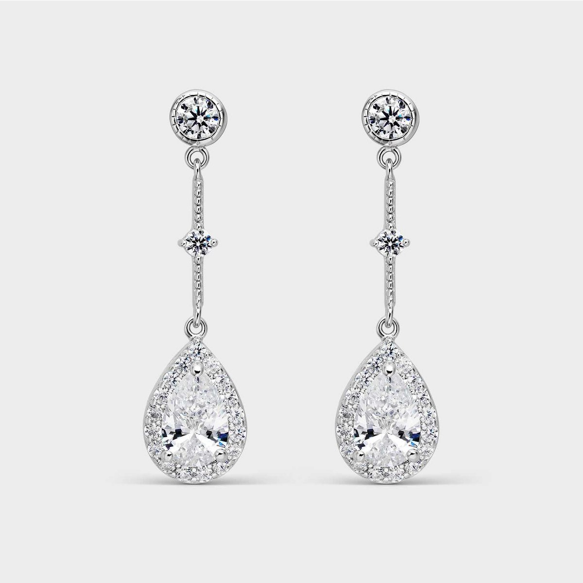 Oval silver earrings and white zircons