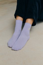 Lavender ribbed crew socks with small heart embroidery detail, soft cotton blend.