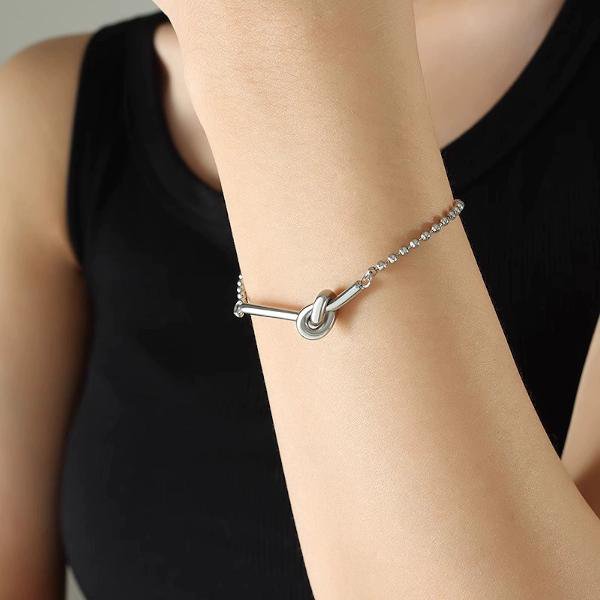 Bracciale con catena a sfere e design con nodo in argento