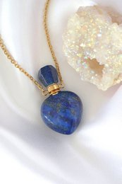 24K gold-plated necklace with natural lapis lazuli crystal pendant. Elegant and sophisticated design, perfect for everyday wear or special occasions.