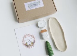 Christmas Giftbox with house, tree and candle
