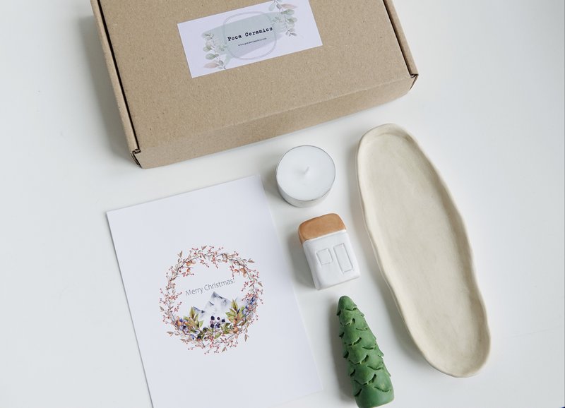 Christmas Giftbox with house, tree and candle