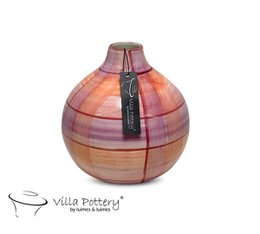 A tall, round vase with a wide mouth and a textured, multicolored glass surface in shades of orange, red, and purple.