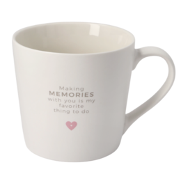  White ceramic mug with text "Making memories" and a small heart icon, suitable for storing and serving hot beverages.