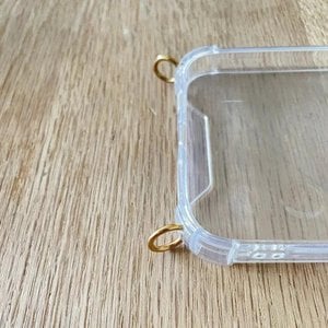 Telefoonhoesje transparant met gouden ringen