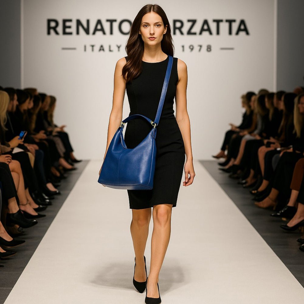RB1017D | Soft women's shoulder bag in genuine leather Made in Italy with single handle and removable shoulder strap. Attachments with shiny gold metal snap hooks - Blue color - Dimensions: 36 x 40 x 13 cm