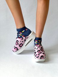  Pink and navy leopard print sneakers with a chunky sole.